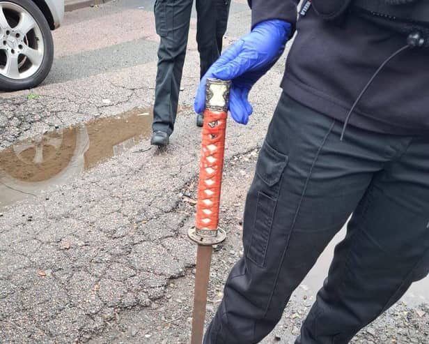 Police seized a sword during the raid in Brickhill