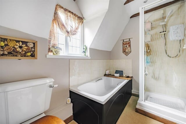 The family bathroom has a bath and a separate shower. There is also a cloakroom downstairs
