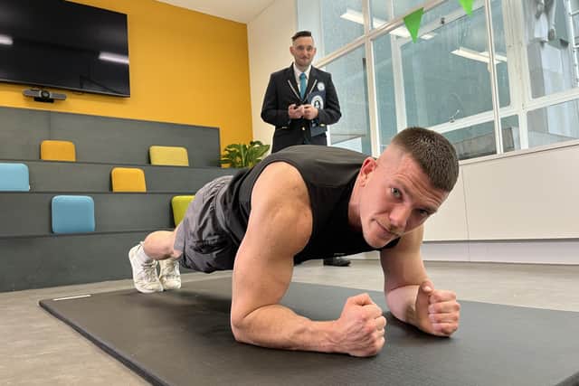 Alex Goulding will attempt to break the Guinness World Record for most plyometric push-ups in one minute at Bedford's Robinson Pool (Picture: Guinness World Records)