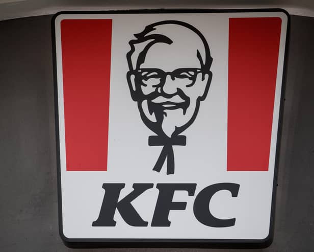 KFC logo on a restaurant. (Photo by SAMEER AL-DOUMY/AFP via Getty Images)