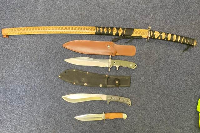 Some of the blades handed into weapons bins in the county