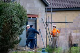 Demolition Contractors arrive at Sir Tom Moore's daughters home. Picture: James Linsell-Clark / SWNS