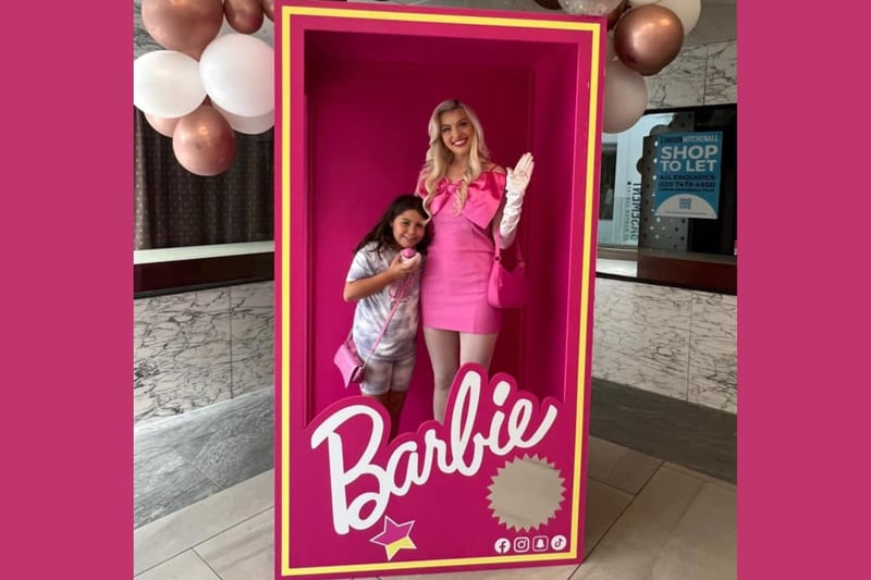 This Barbie fan was pictured with a life-size model of Barbie during the Barbie box event at Bedford's Harpur Centre.