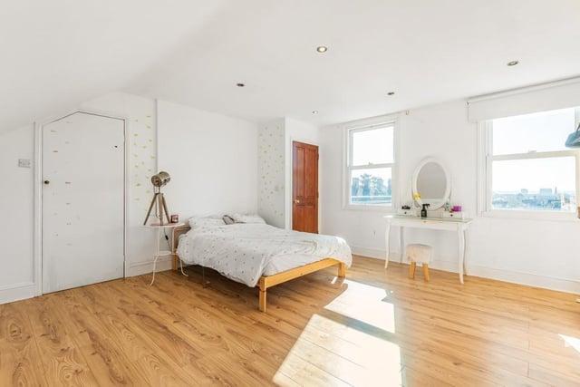 This room on the top floor measures 14ft 9in by 14ft 9in. It has two large windows which have amazing views of Bedford. There is built-in storage as well as eaves storage