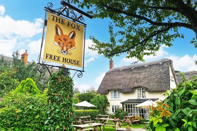 "A charming thatched community pub with a warm welcome and an attractive garden popular with families," says the guide