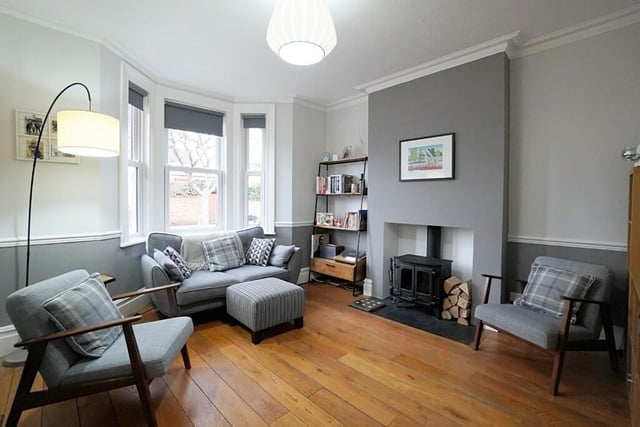 The sitting room has a bay window to the side which benefits from direct west facing sunlight. There is a log burner and wooden flooring setting the tone for this room