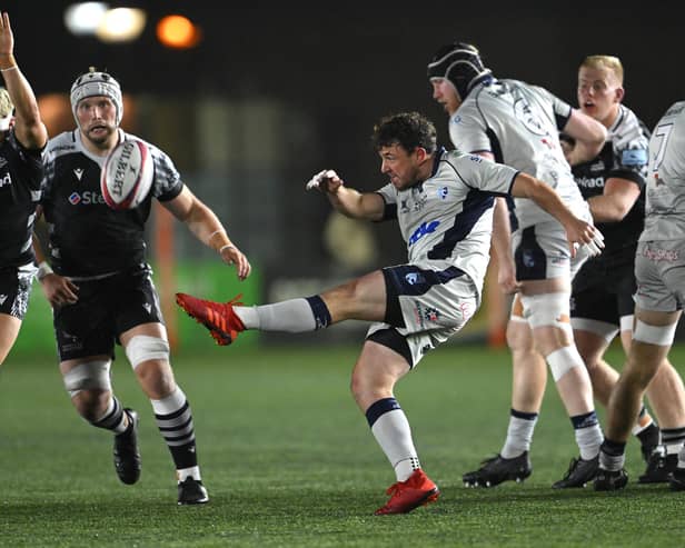 Blues scrum half James Lennon kicks upfield during the Premiership Rugby Cup match at Newcastle Falcons. Photo: Getty Images.
