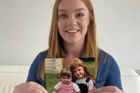 Lucy holding a picture of her and her sister, Fleur. Picture: Lucy Tubott
