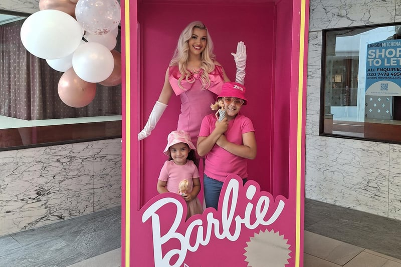 These two youngsters were in the pink as they posed in the iconic Barbie box which had stopped off at the Harpur Centre as part of a national tour to celebrate the release of the giant hit movie Barbie. Pictured are Barbie obsessed Lillyah, aged nine and four-year-old Lolah.