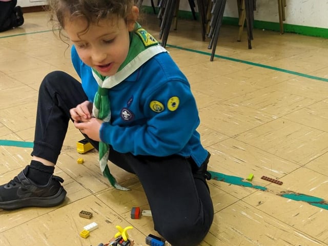 A Beaver constructing something with Lego