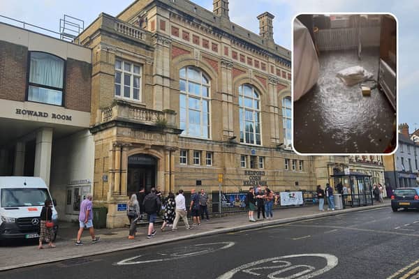 People are turned away from the Corn Exchange and inset, a tweet from Dara O Briain reveals the flooding inside