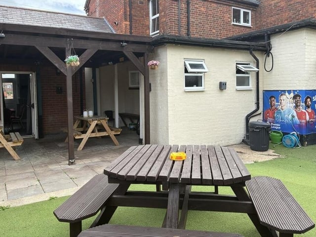 The rear garden provides further seating and space for outdoor entertaining