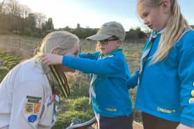 Autumn, Megan and William present Nicky with her Silver Acorn