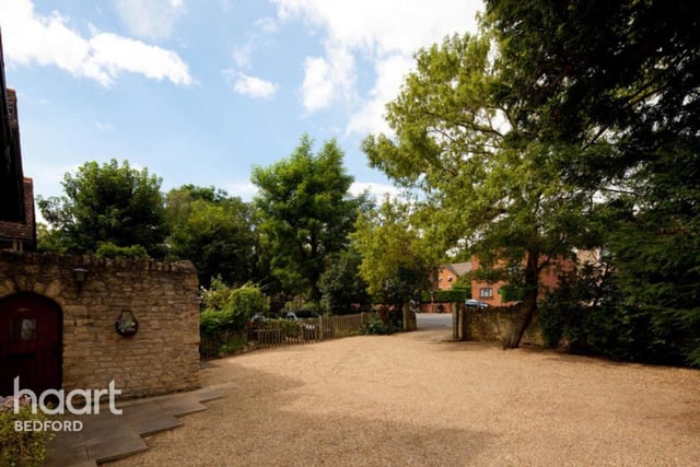 The property is approached through the stone-built gateway to the front garden which is mainly laid to gravel and offers extensive off-road parking