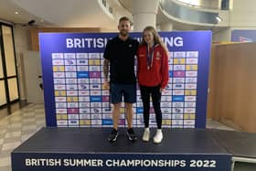 Eloise Cole and head coach Laurence Mills after securing a silver at the British Summer Championships.