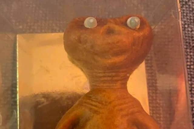 A forty-year-old, uneaten marzipan model of sci-fi movie alien E.T. has been uncovered by the relatives of a film buff after he died.