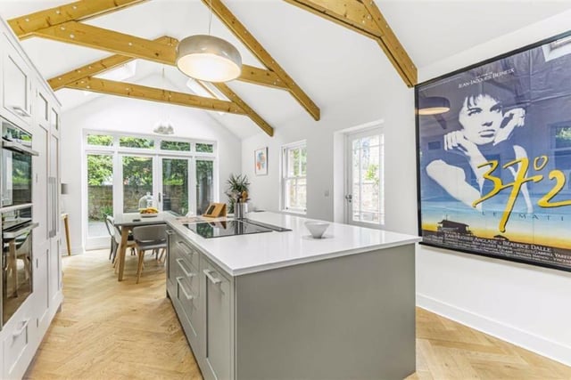 The kitchen units are hand-built and there are Quartz worktops and integrated appliances such as an oven, oven/microwave combination, dishwasher and wine fridge. Perhaps the sellers will let you keep the iconic Betty Blue picture too. Here's hoping...