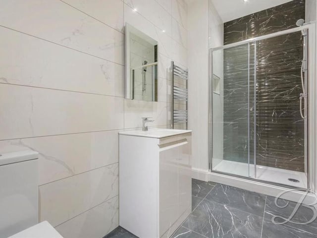 Pristine en suite facilities await whoever is lucky enough to be sleeping in bedroom one. The suite comprises a shower cubicle, low-flush WC and wash hand basin.