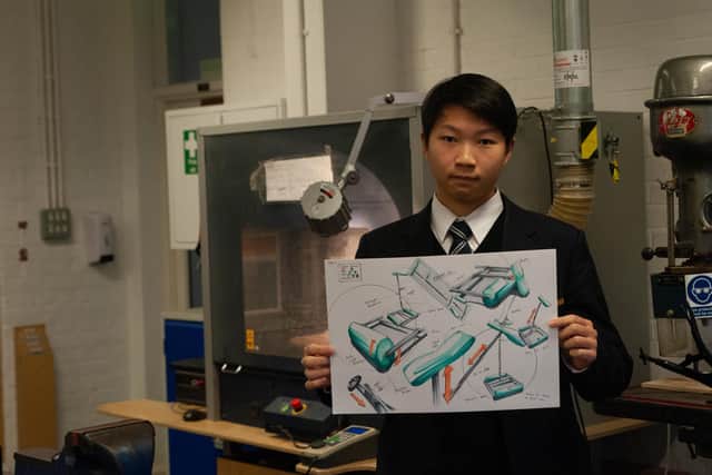 Bedford School's Jameson Liang with examples of his work