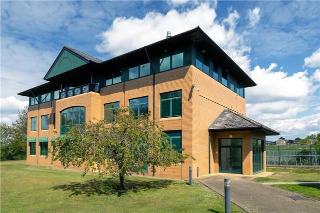 College House is a modern three-storey office building constructed of brick elevations incorporating double glazed windows and doors beneath a pitched tiled roof