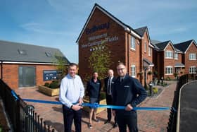 Paul Smits, managing director for Bellway Northern Home Counties, and Aly Morehen, sales manager for Bellway Northern Home Counties,  open the show homes at New Cardington Fields