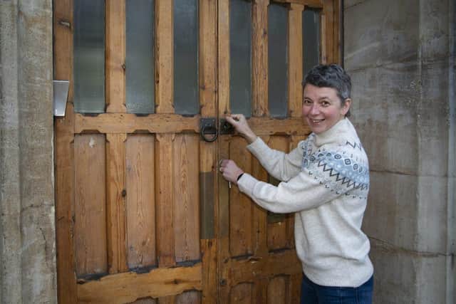 Kirstie Cook, CEO at King’s Arms Project, opening the door to Bedford Guild House