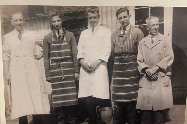 This old black and white picture was taken in 1943 and shows, from left, Joseph Ashpole, his son Peter, business partner 'Mac' Williamson, a Mr Hall and Joseph's father-in-law, Mr Linsel. Joseph was a pigeon fancier and the cup was related to his hobby