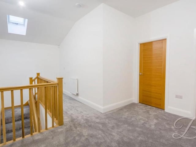 At the top of the stairs, we are greeted by this good-sized landing, which has doors to the other four bedrooms.