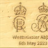 The specially-designed engraving – the width of a human hair –uses ‘recycled’ gold to commemorate the Coronation of King Charles III
