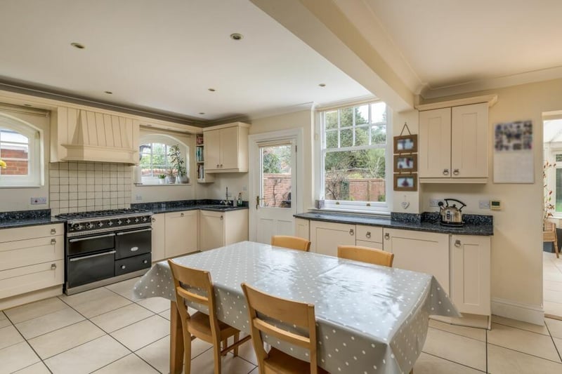 Here, there’s plenty of storage and a fitted Welsh dresser, alongside granite surfaces, a Franke sink, a range oven, Neff microwave and brand-new Neff dishwasher