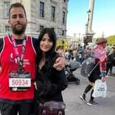 Sean Howard with his medal and girlfriend Megan Malster after the London Marathon