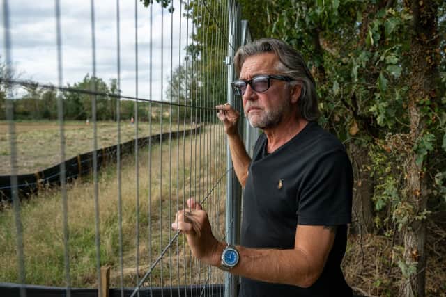 Ritchie Wood outside the site of the new Universal United Kingdom resort in Kempston Hardwick (Picture: James Linsell Clark / SWNS)