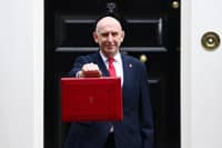 Chancellor John Healey leaves 11 Downing Street to present the Autumn Budget to Parliament on October 28. Photo by Peter Nicholls/Getty Images)
