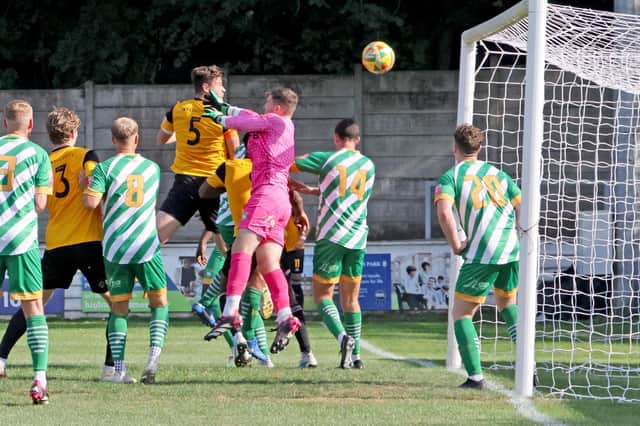 Alex Collard heads home Bedford Town's first goal at Aylesbury. Photo: Simon Gill.