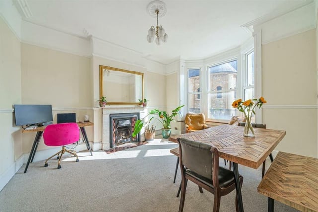 Both the dining room and sitting room boast central marble fireplaces, bay windows and original architraves and cornice