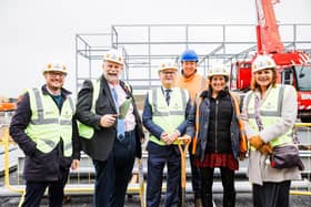 A special celebratory event to mark the steel frame completion of the school