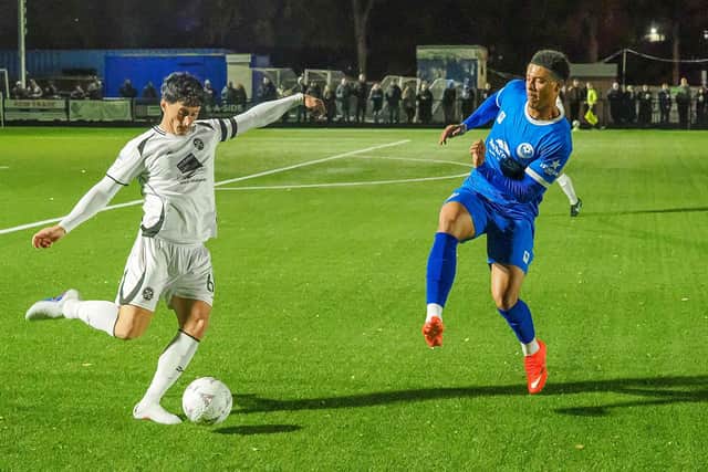 Reece Evans looks to shut down a ball forward - pic: Adrian Brown