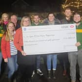 Bedford Young Farmers present a cheque to Sue Ryder St John's Hospice
