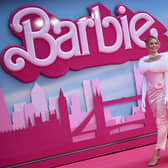 Margot Robbie poses on the pink carpet for the European premiere of Barbie in London  (Photo by JUSTIN TALLIS / AFP) (Photo by JUSTIN TALLIS/AFP via Getty Images)
