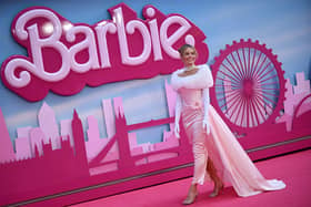 Margot Robbie poses on the pink carpet for the European premiere of Barbie in London  (Photo by JUSTIN TALLIS / AFP) (Photo by JUSTIN TALLIS/AFP via Getty Images)