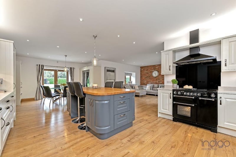 Measuring 30ft 1in by 22ft 4in, this room is perfect for entertaining with a central island with space for seating, there is also French doors which take you on to the rear garden. The kitchen is a Shaker design.