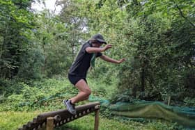 A Scout jumping off a platform