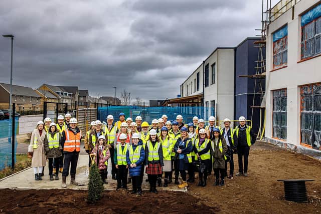 Pupils and official guests at the topping out ceremony at Wixams Tree Primary School