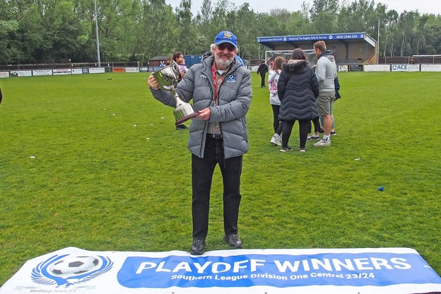 Eagles chairman Adrian Brown with the play-off winners' trophy.