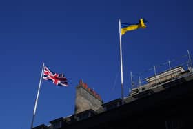 The Ukrainian flag being flown above 10 Downing Street