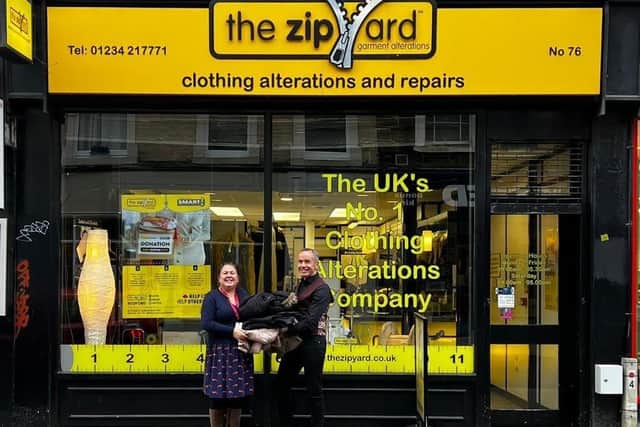 L-R: Sarah Grimes, fundraising and volunteering manager at Prebend St Day Centre, Graeme Mulheron, owner of The Zip Yard Bedford
