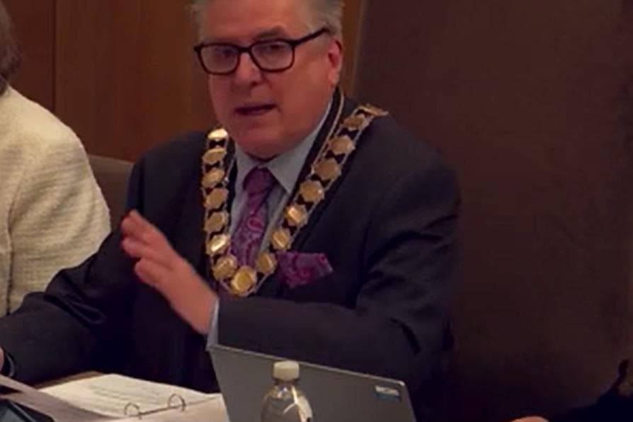 Bedford council speaker in court charged with threats to kill