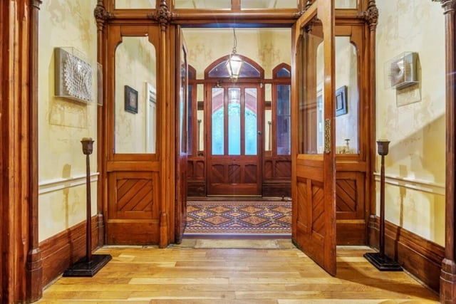Very grand, this house boasts oak hand carved doors, retained original marble fireplaces and ornate coving