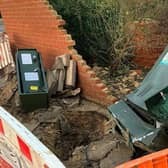 The accident opposite Budgens in Kimbolton Road, damaged a  wall and destroyed a BT broadband box.
Photograph: Dom Carter