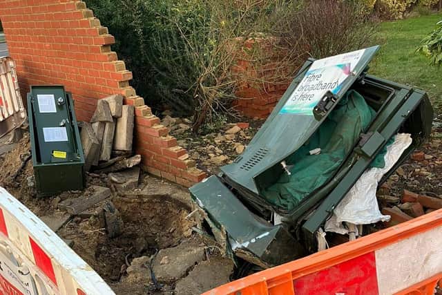 The accident opposite Budgens in Kimbolton Road, damaged a  wall and destroyed a BT broadband box.
Photograph: Dom Carter